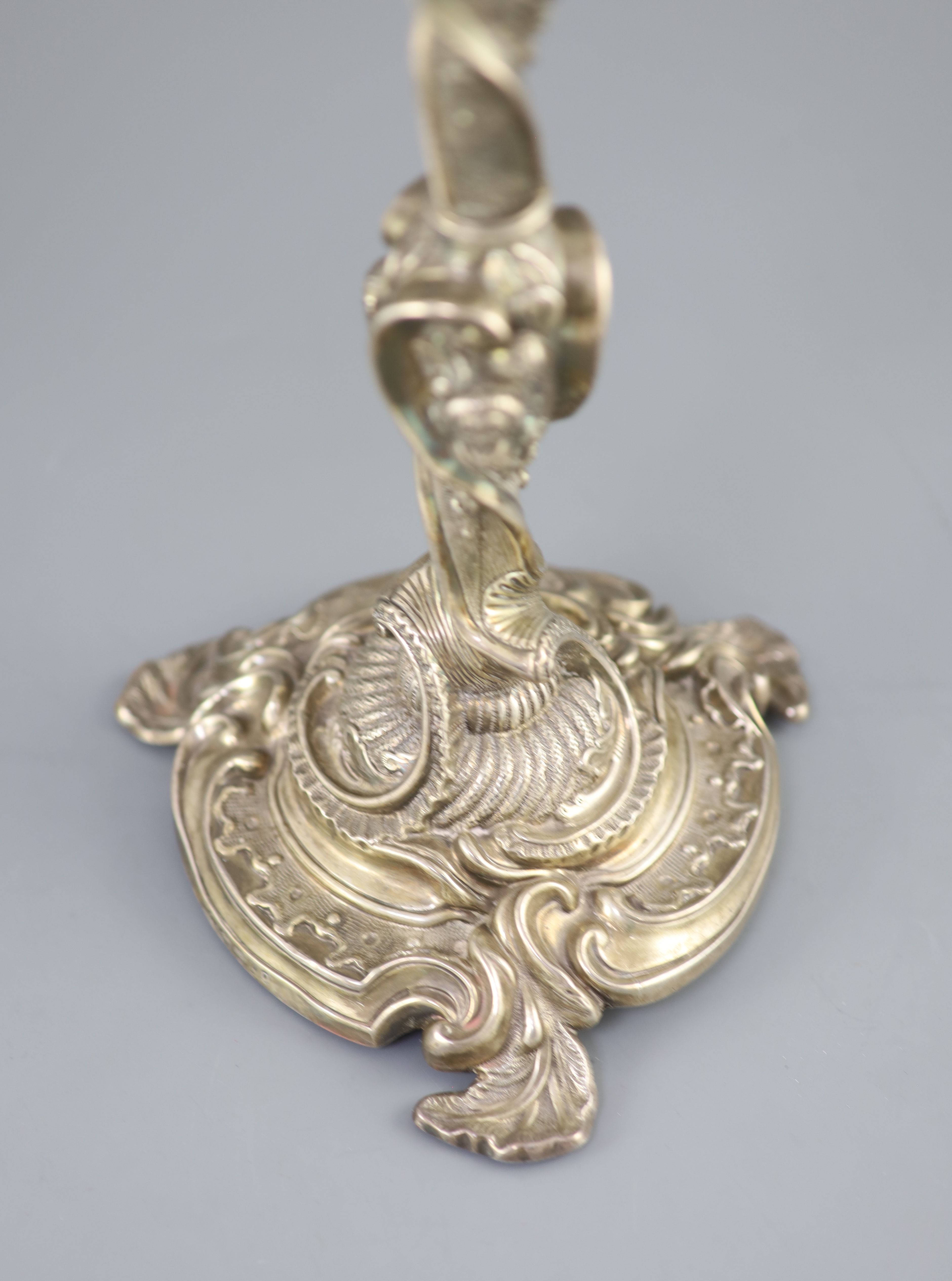 An ornate George III silver three branch, three light candelabrum, by Samuel Roberts, George Cadman & Co (a.f.),